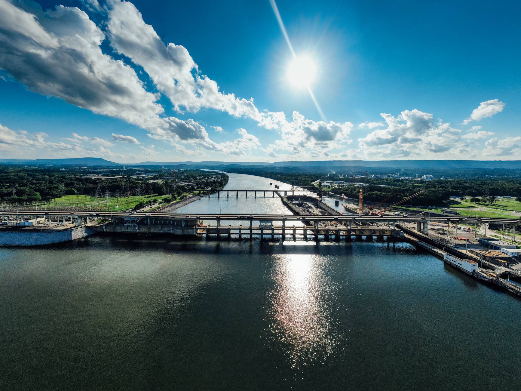 aerial photo of bridge under blue sky during daytime